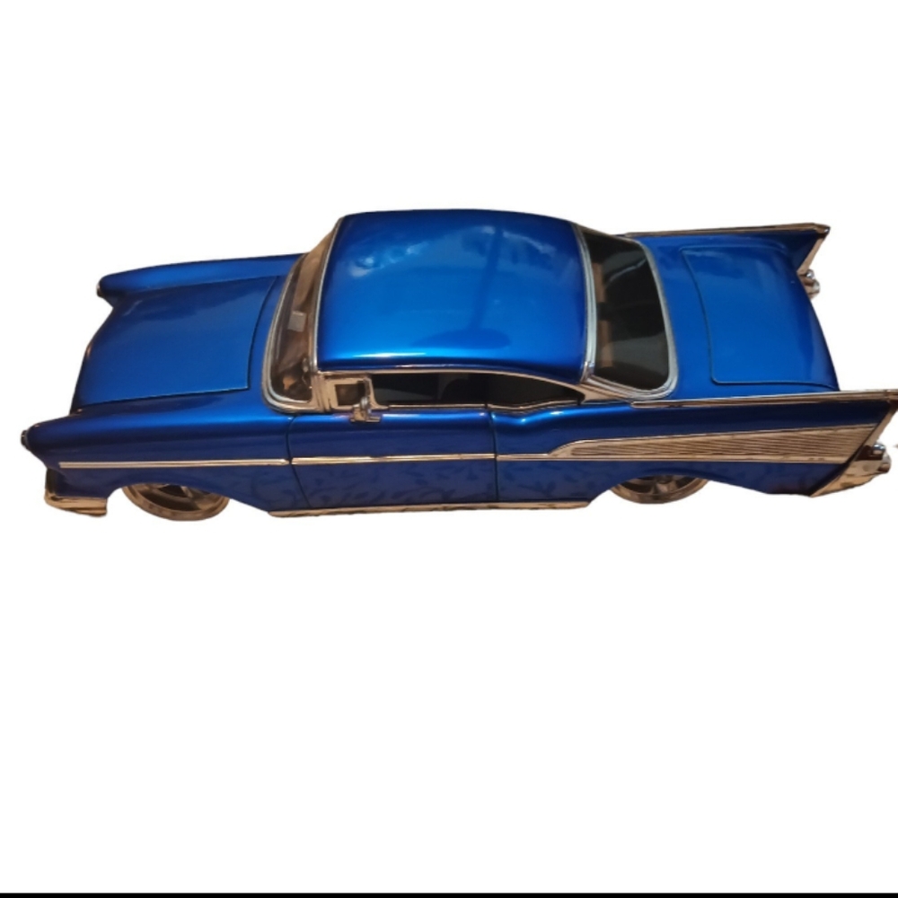 Jada toys 1957 electric blue Chevy bel low rider 1/24 scale model car